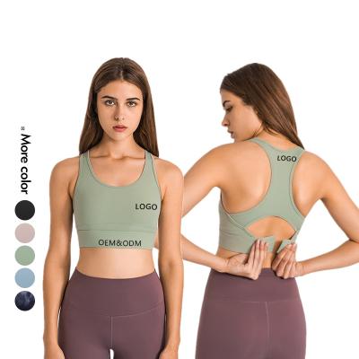 China Xsunwing Athleisure Yoga Activewear Gym Wear Women Yoga Seamless Four Way Sports Bra Xxxx Hot Sexy Halter Sports Bras for sale