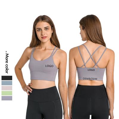 China Xsunwing Breathable Wholesale Apparel Women Hollow Out Sports Custom High Print Logo Fitness Sportswear Bra Beauty Back Yoga Cool Dry Bra for sale