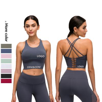 China Xsunwing OEM ODM deportivo de ropa yoga sport BH bluey indoor naked gym clothing superdry clothes cross back sexy woman sports bra for sale