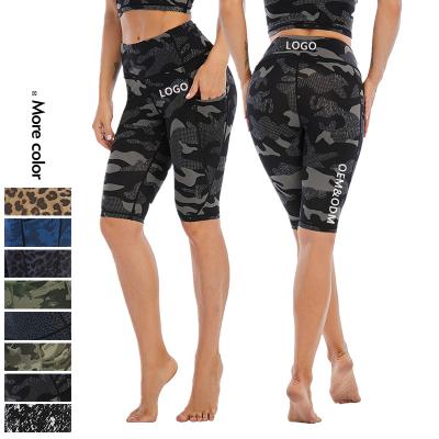 China Xsunwing Breathable Wholesale Women Running Camouflage Leopard Printed Yoga Gaiters With Pocket Spandex Sexy Sports High Waist Yoga Biker Shorts for sale