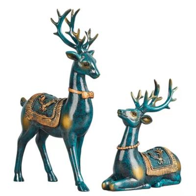 China Creative gifts resin business mini country promotion deer design figurine for home decoration for sale