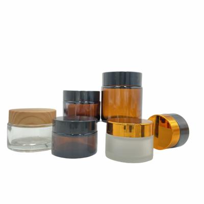 China Custom Empty Round Cosmetic Cream Packaging 5ml 10ml 20ml 30ml 50ml Clear Glass Jar for sale