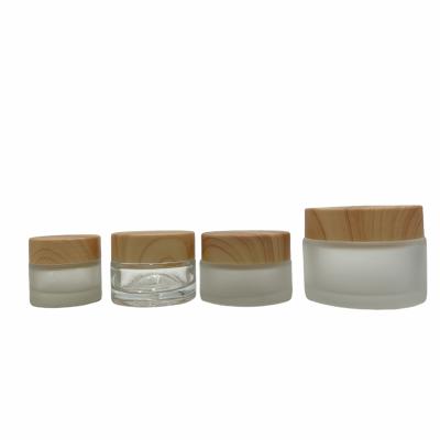 China New Design 200ml Green Cosmetic Packaging Cream Jar Cream Glass With White Screw Cap for sale