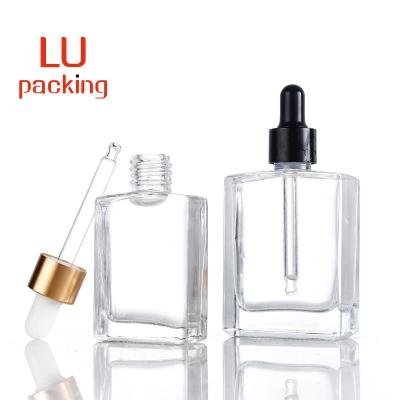 China High End Personal Care Square Clear Glass Dropper Bottles 30ml 50ml 100ml Rectangle Glass Dropper Bottles With Gold Cap For Essential Oil for sale