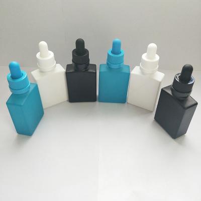 China Frosted White Matte Glass Dropper Bottle 30ml Black Rectangle Eliqiuid Beard Oil Bottle Personal Care With Custom Paper Packing Box for sale