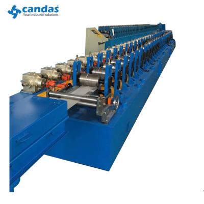 China Huanzhong aluminum alloy most competitive price roller shutter slat making machine, high quality and high speed for sale