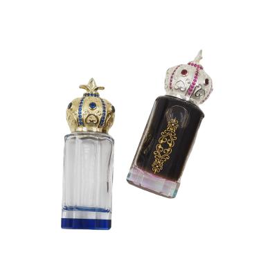 China Special Personal Care Shape Glass Luxury Arabian Jewelery Cap Attar Tola Bottle With Crystal Base for sale