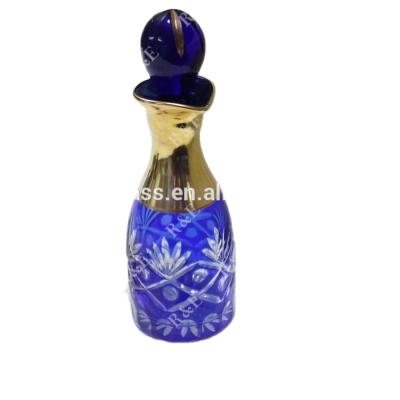 China Blue Glass Arabic Glass Display Bottle Essential Personal Care 120ml Oud Oud Decanter for sale