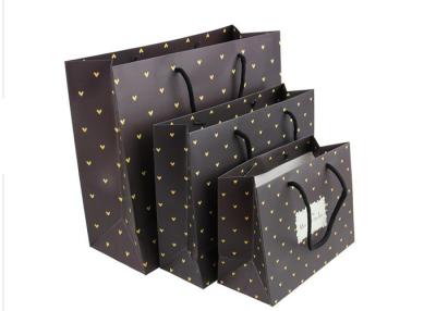 China Eco - Friendly Material Custom Printed Paper Bags With Portable Handles for sale