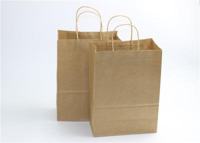 China Luxury Handmade Recycle Kraft Paper Bags With Handles for Garment for sale