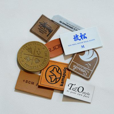 China Washable Custom Embossed Brand Name Logo Jeans Back Leather Patches Sewing On Backing For Leather Labels for sale