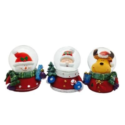 China Resin Santa Slaus Christmas Theme World Wholesale Snow Globe For Sale for sale