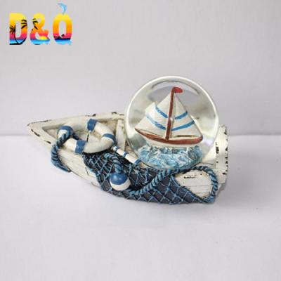 China Custom Europe Australia Sailing Boat Polyresin Snow Water Globe for sale