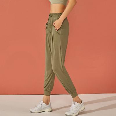 China 2021 new sports women's pants leisure pants loose dry breathable fitness yoga running pants fast for sale