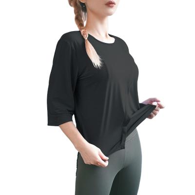 China New Drawnwork 2021 Loose Slim Quick Dry Running Breathable Yoga Suit Shaping 7/10 Length Sleeve Sports T-Shirt for sale