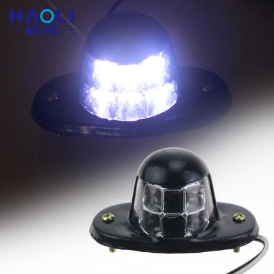 China Black High Brightness High Brightness Truck Trailer General Use Housing 6 LED Iron License Plate Lights for sale