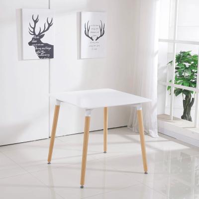 China New Designed High Quality Nordic Style MDF Top Square Cheap Restaurant Dining Table With Solid Wood Legs for sale