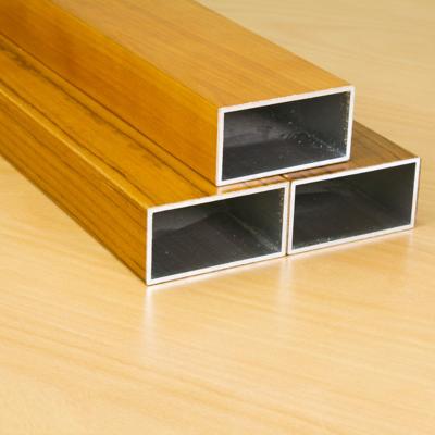 China Decoration Wood Grain PVC Wrapped Aluminum Profile Molding For Decoration for sale