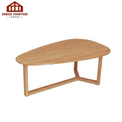 China Modern solid wood mango shape simple style solid oak wood coffee table for living room for sale