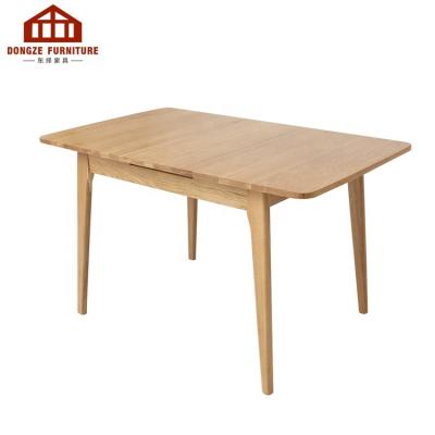 China Length Adjustable Space Saving Solid Wood Extendable Dining Table for sale