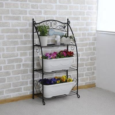 China Modern Wholesale Three Tiered Outdoor Garden Flower Stand Pots Rack for sale