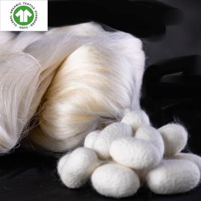 China Wholesale High Tenacity Mulberry Raw Silk Yarn 100% Southsilkroad Raw Mulberry Silk Cocoons For Clothes for sale