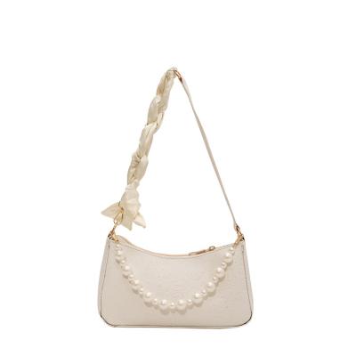 China Fashion Sell High Quality Cheap Solid Handbags Fashion Handbag Pearl One Shoulder Bags With Sashes for sale