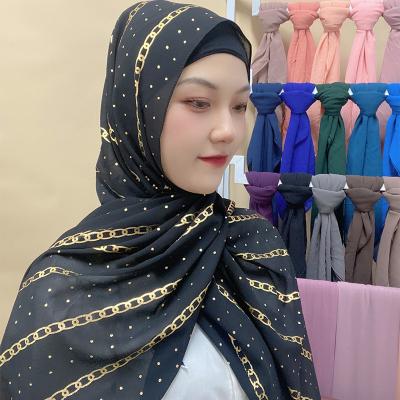 China Modest Muslimah Styling Malaysian Muslim Women Fashion Suntan Hijab Scarf Black Chiffon Suntan Gold Floral Hijab Shawl for sale