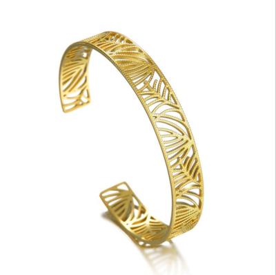 China New style 18K gold plated Korean simple hollow leaf bangle opening nickel free gold plated stainless steel bangle for women for sale