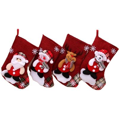 China Eco-Friendly Christmas Stockings 4Pieces Set 9 Inch Santa Wapiti Snowman Bear Fireplace Cute Plush 3D Applique Stocking for sale