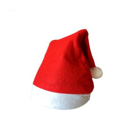 China Soft Cheap Price Part Use Red Nonwoven Christmas Hat Santa Hat Wholesale for sale