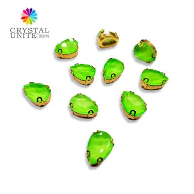 China Pointback CRYSTAL UNITE machine cut glass teardrop rhinestone fancy stone fluorescent color in claw setting for sale