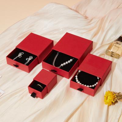 China Recycled Materials Wholesale Transparent Fashion Jewelery Box Colorful Floating Pe Film Jewelery Box For Necklace Bracelet Ring Gift Case for sale