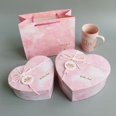 China Recycled Bow Heart Shaped Gift Box Materials Factory Flip Wedding Festival Octagonal Pink Wrapping Paper Gift Box for sale