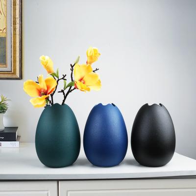 China Spring Modern Easter Eggs Shaped Porcelain Art Vase Fresh Flower Vase Minimalist Dry Floor Decorative Flower Vases for sale