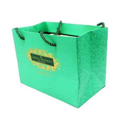 China Wholesale Custom Eco Friendly Recyclable Candy Bags Customize Chocolate Specialty Paper Foldable Shopping Bag With Rope Handles for sale