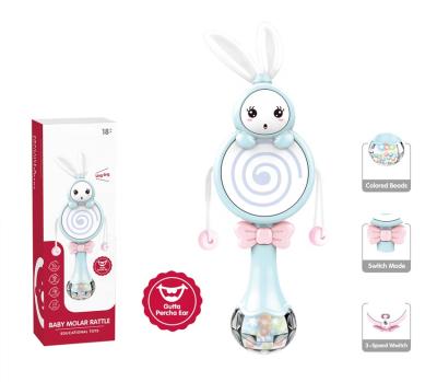 China Electronic Baby Toy Cheap Plastic Cartoon Hand Ratchet Shaker Bed Bell Molar Rattle Toy Stick Teether With Music and Lights for sale