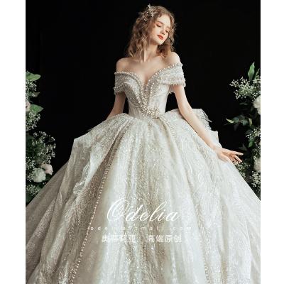 China Breathable light champagne strapless wedding dress bridal appliques fabric bridal beaded wedding dress for sale