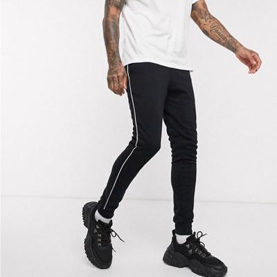 China OEM Manufacturer Men Track Cotton Cloth Hose Side Design Skinny Sports Tracksuit Men Anti-wrinkle for sale