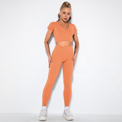 China Breathable Gym Equipment Long Sleeve Crop Top 2 Piece Workout Set Women Butt Crac! crack! the elevator booty gaiter set for sale