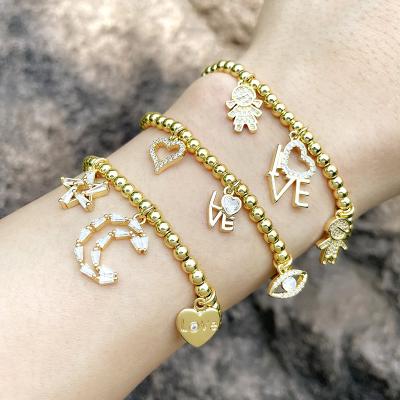 China Copper Beads Strand Bracelet Gold Plated Stretch Beads Boy Girl Lover Bracelet Hollow Zirconia Star Moon Pendant Bracelet for sale