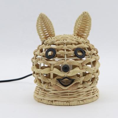 China MBC 2022 New Design Originality MBC 2022 Originality Rattan Desk Lampshade Animal Handmade Home Decor Rabbit Shape Water Hyacinth Night Light Table Lamp for sale