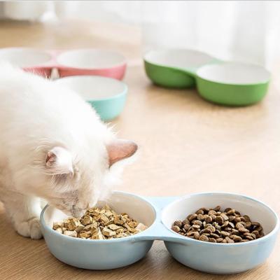 China Good quality viable cartoon printing double bowl pet bowl clean ceramic smooth easy easy cat cat bowl for sale