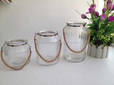 China Reuse; wholesale clear glass vase stocked with rope handle for garden decor for sale