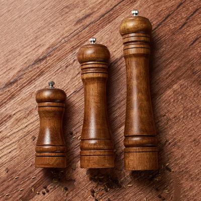 China 2021 Hot Sale Art Decor Amazon Acacia Wood Manual and Kitchen Ceramic Salt Pepper Mill Grinding Grinder for sale