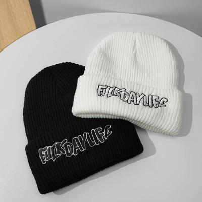 China 2022 COMMONS new style Beanie Winter Hats Plain Beanie custom knitted unisex with custom logo for sale