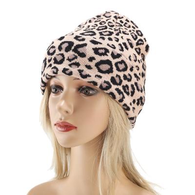 China COMMON Fashion Winter Women Crochet Knit Beanie Warm Love Knitted Hat With Pom Pom Winter Ski Hat Leopard Style Women for sale