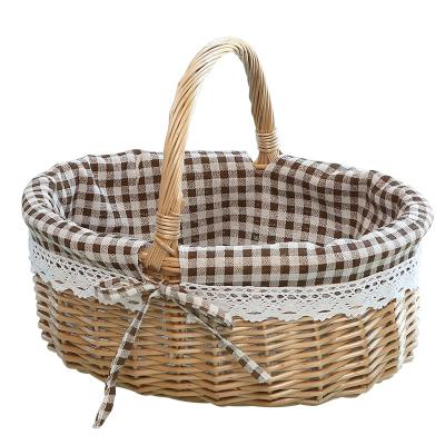 China Sustainable Handmade Wholesale Willow Storage Baskets Laundry Cloth Picnic Wicker Basket With Liner for sale