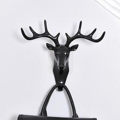 China Modern Animal Creative Adhesive Plastic Key Holder Hanger Storage Hook Wall Shape Antler Wall Mounted Hooks for sale