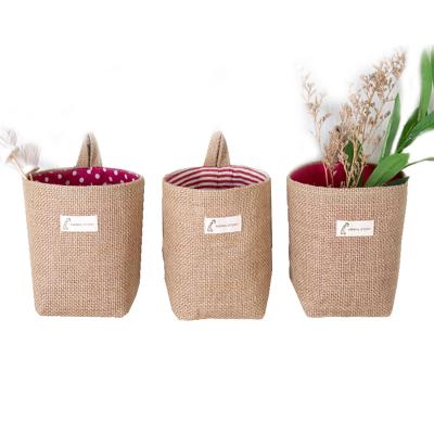 China Modern Custom Creative Cotton and Burlap Desktop Storage Basket Storage Hanging Bag for sale